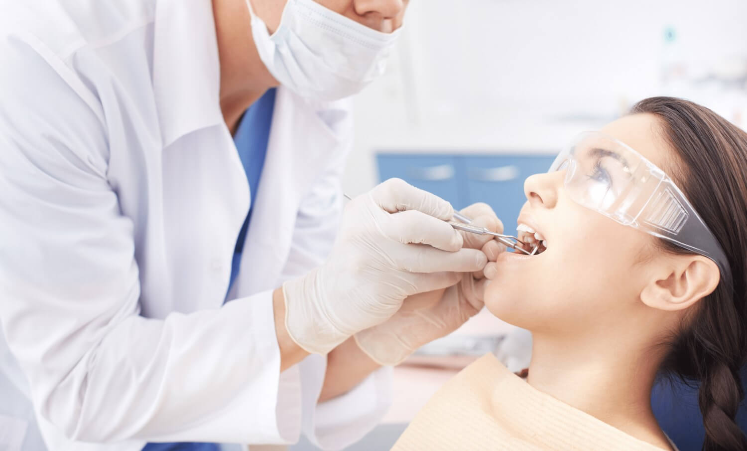 woman receiving post operative care on wisdom teeth extraction dental services