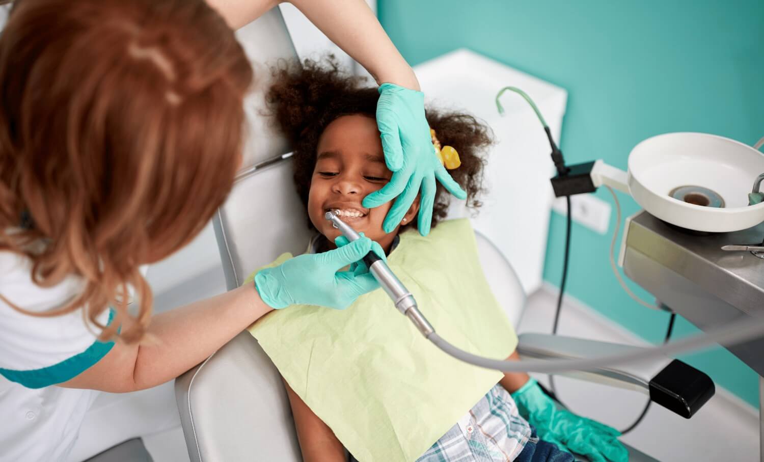 Child receiving pediatric dental sealants Child receiving pediatric dental sealants