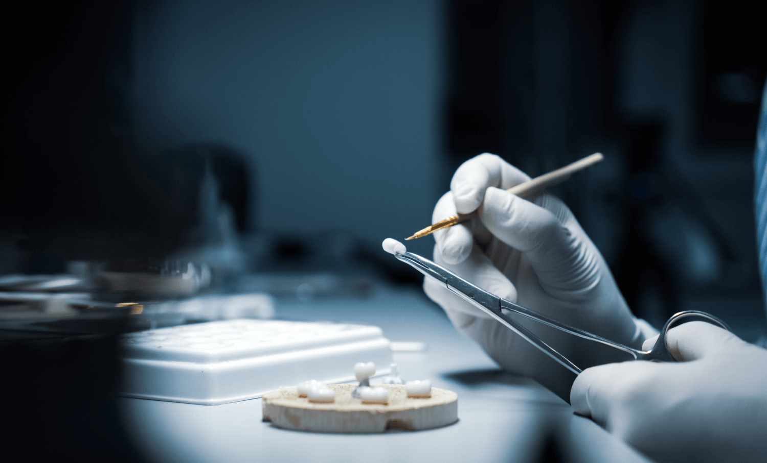dental_crown A care provider creating a dental crown