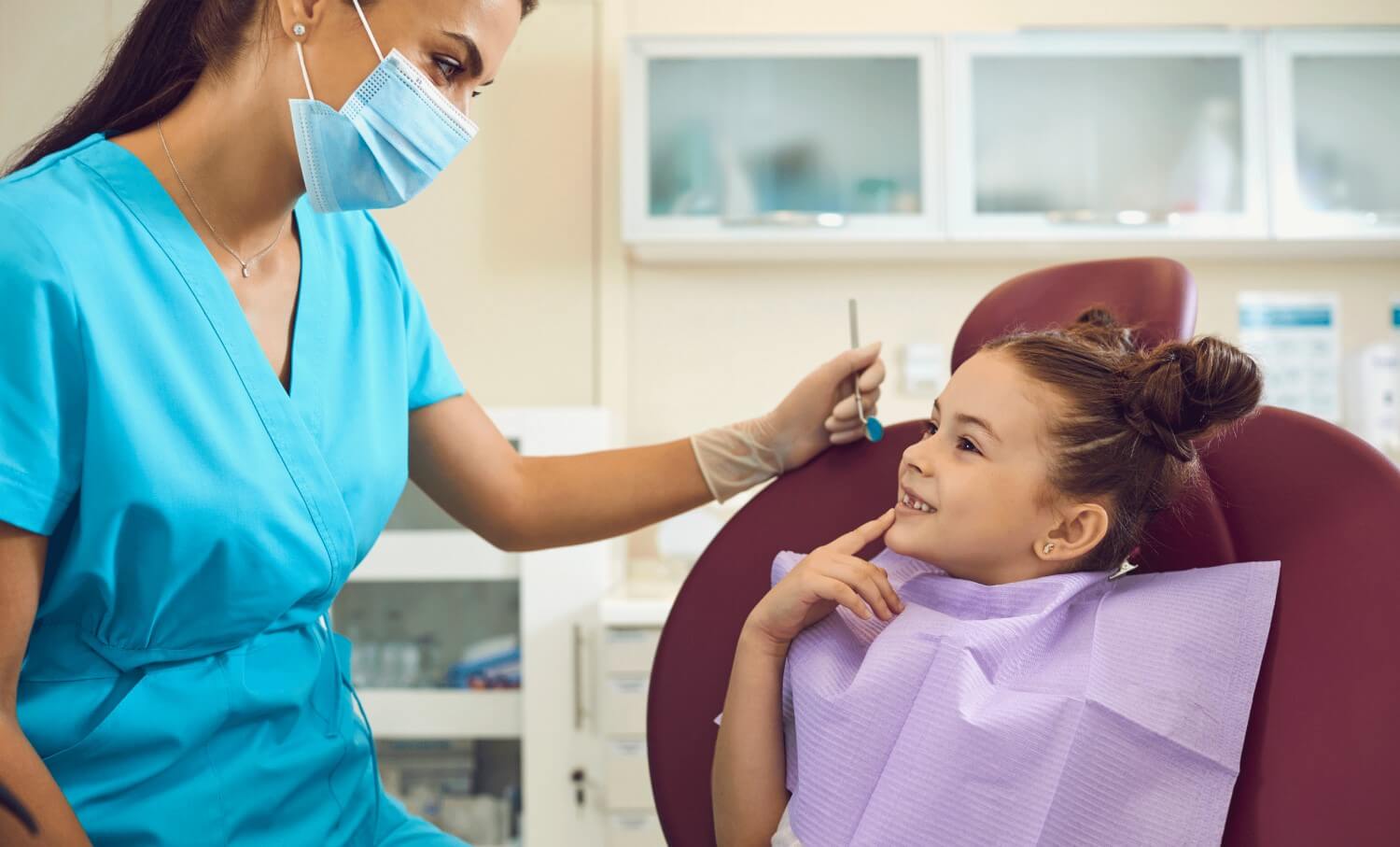 young girl getting a check up for pediatric dental sealants young girl getting a check up for pediatric dental sealants